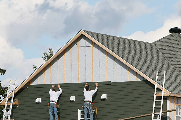 Professional Vinyl Siding technician working in Highspire, PA